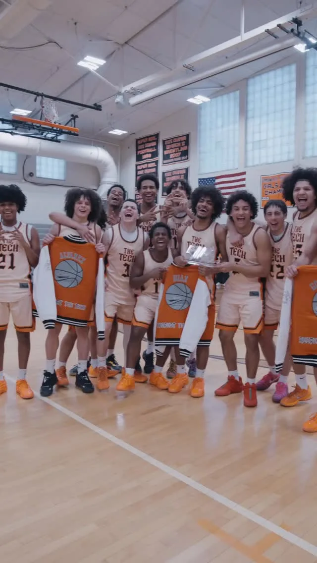Greater Lawrence basketball players celebrating a championship in Run the Stats coverage
